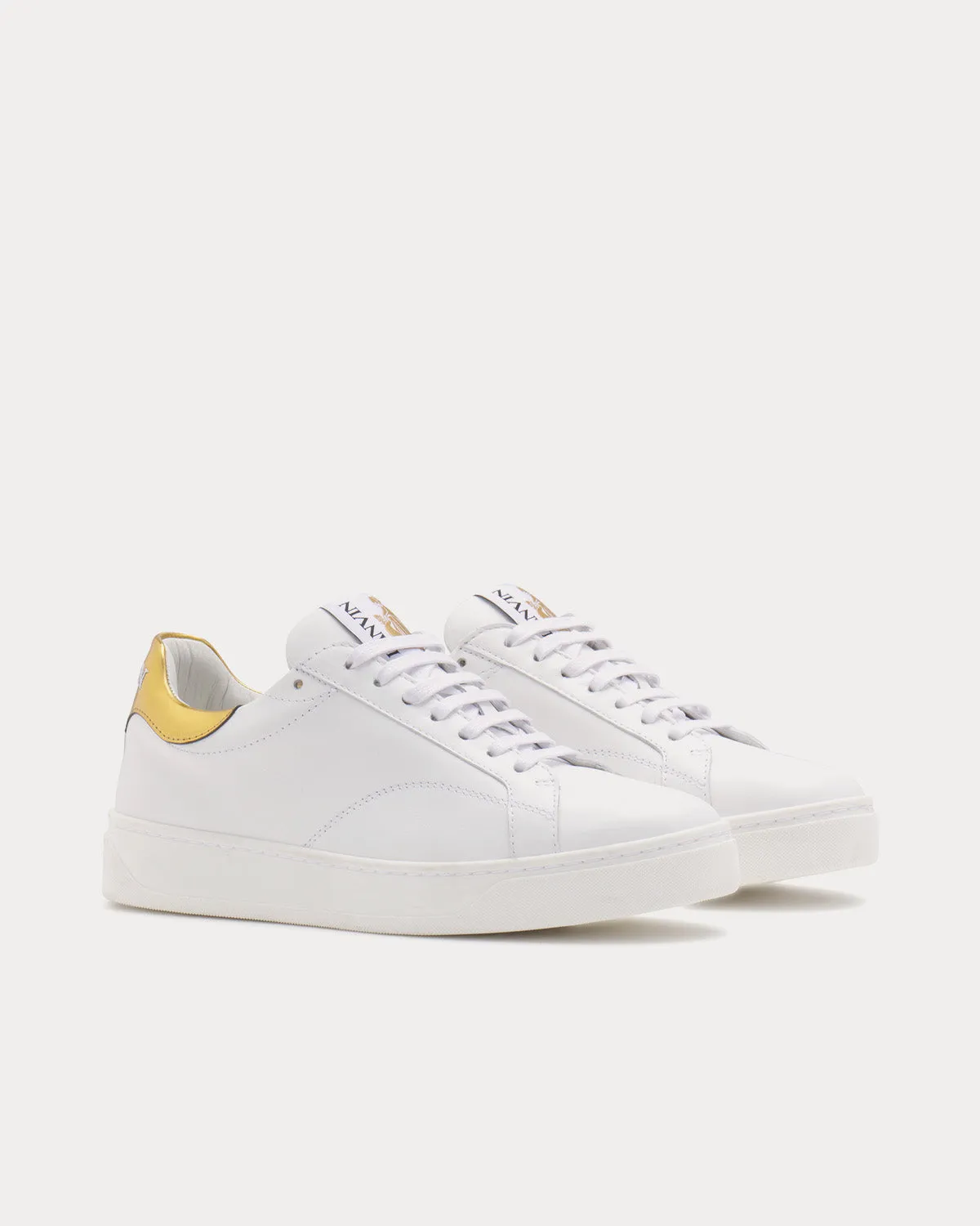 DDB0 Leather White / Gold Low Top Sneakers