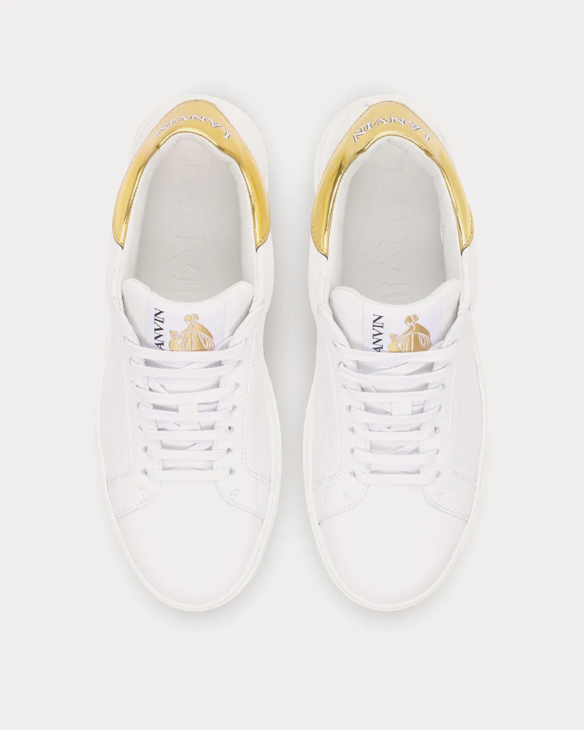 DDB0 Leather White / Gold Low Top Sneakers