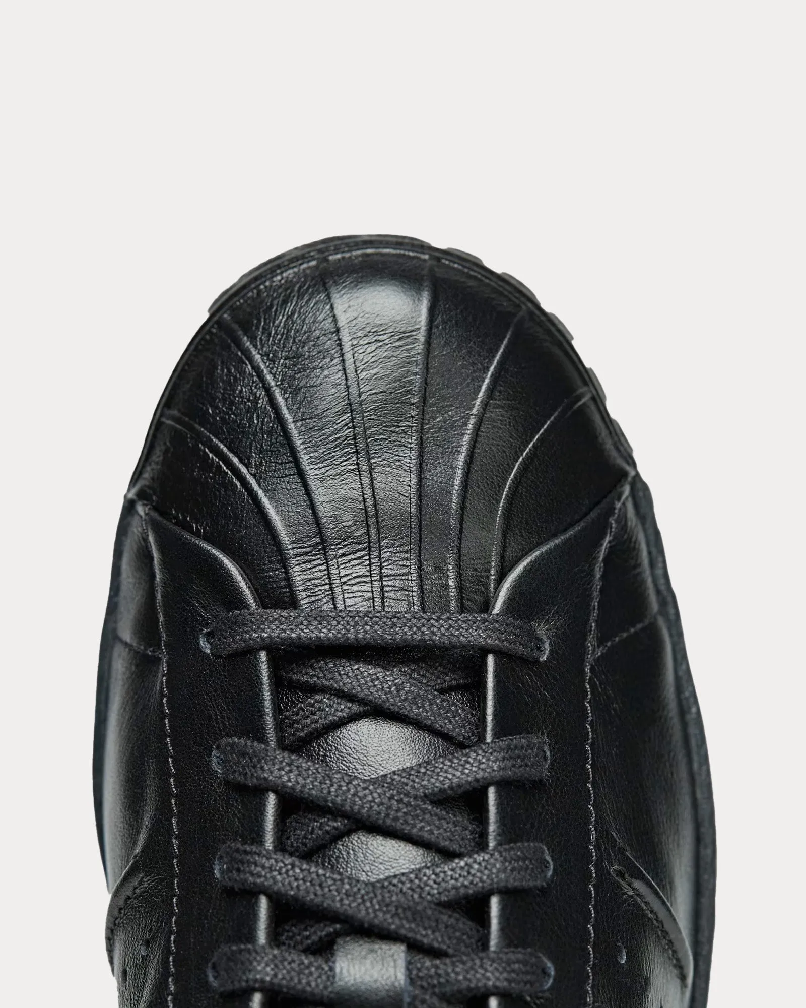 Superstar Leather Black / Black / Black Low Top Sneakers